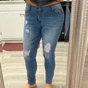 Ripped skinny jeans.